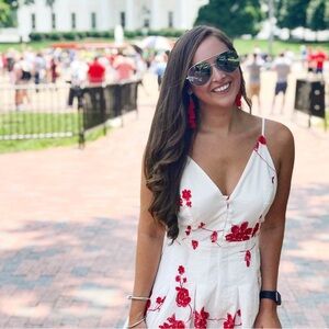 White and red rompher! Size medium and only worn once!